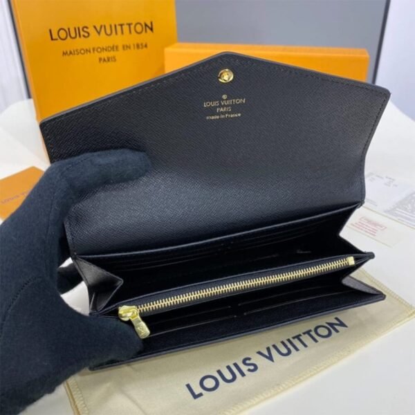 147D111A-5258-1528-ACCA-46A4F25855F4.jpg Louis Vuitton Sarah Wallet M80726
