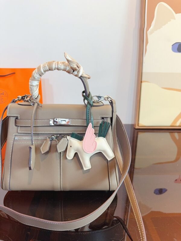 236895DB-B72D-C20D-D513-59DA66B4FF36.jpg Kelly 25 Bag