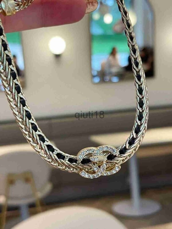 3B60DBFA-D241-059A-D47F-E5197ADC4CE6.jpg Black leather chain double C stirrup bracelet