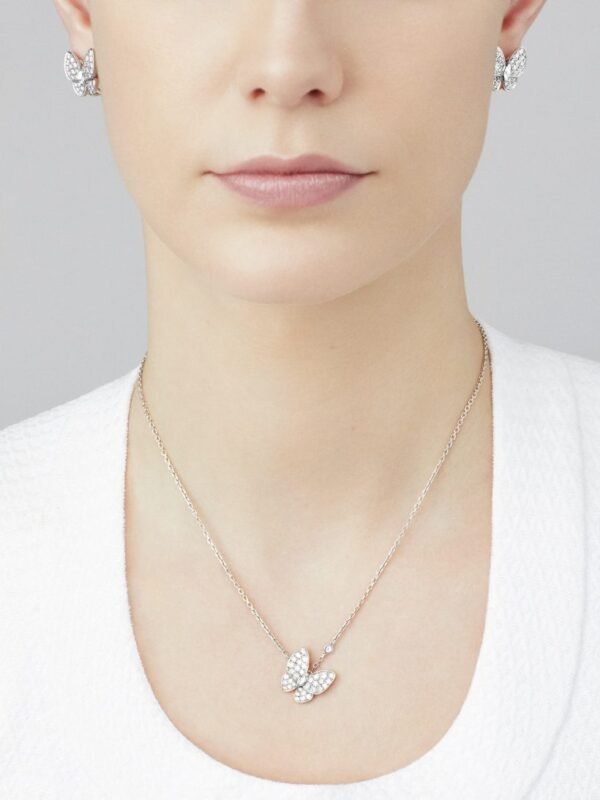 82E97539-9F5C-7249-5CA9-482DB35CAD25.jpg Two Butterfly earrings