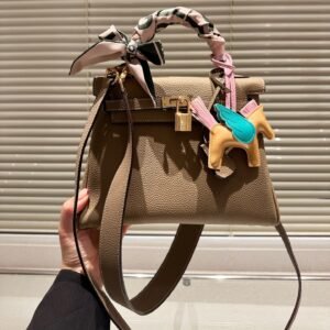 9E90DB8E-5CDF-E07F-2746-1A6A53ABD469.jpg Kelly 25 Bag - Coffee