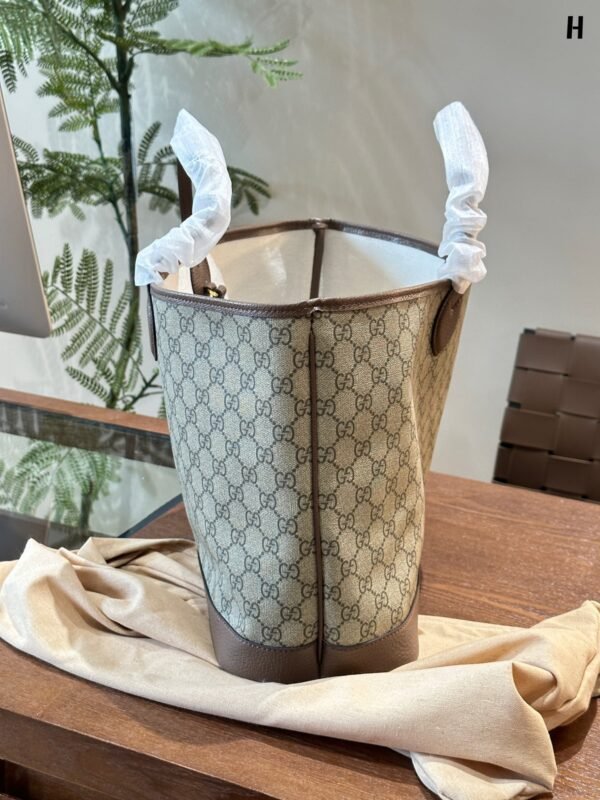 C58FA9F9-35C2-59A7-1975-CDBAF76D1948.jpg OPHIDIA LARGE TOTE BAG