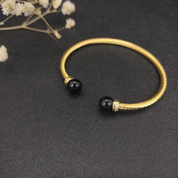 C7B58BF8-1F70-EA09-9FA2-475B88493756.jpg Solari Cablespira® Bracelet 18K Yellow Gold with Black Agate and Diamonds, 3mm