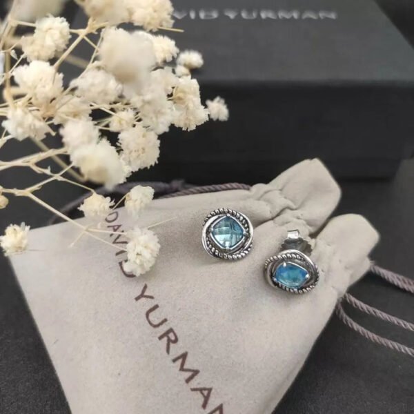 D676A131-8A3E-A038-801E-04E40BAC623B.jpg Infinity Stud Earrings Sterling Silver with Blue Topaz, 13mm