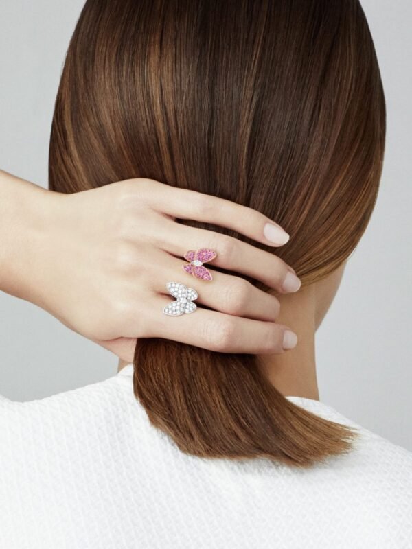 F8856FAC-EEA7-3E4B-0082-144885F8DFAF.jpg Two Butterfly Between the Finger ring