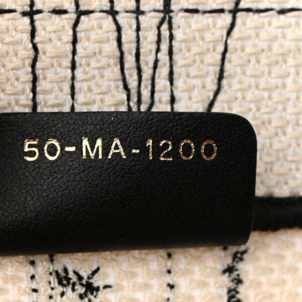 3c5864f6e9da2804f6b2babf060d1f5f.jpg Canvas Embroidered Zodiac Book Tote Latte Multicolor