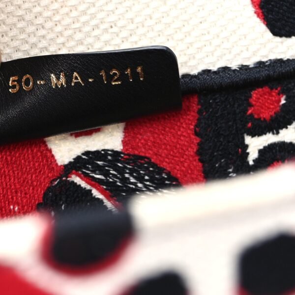 533f84ca0f64dcfb4a49177702107f6b.jpg Canvas Embroidered Medium Cupidon Book Tote Latte Multicolor