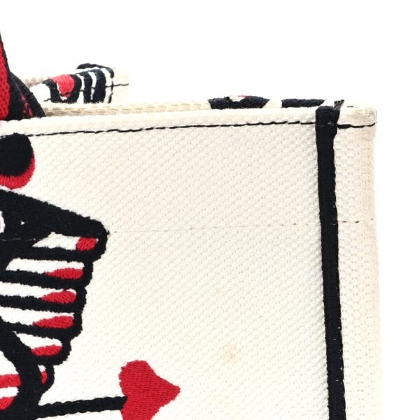 869337f73c81d7be2a89f76933cca40a.jpg Canvas Embroidered Medium Cupidon Book Tote Latte Multicolor